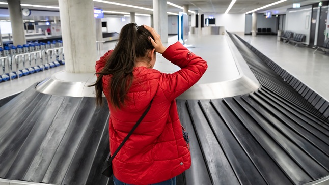upsetwomanlostbaggagewhiletravelingbyplane