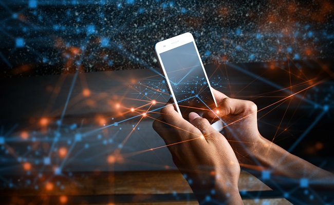 businessmanusesmartphoneonlinetosocialnetworktouchscreendeviceconnecting