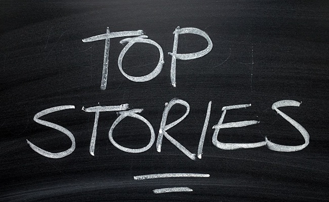 thewordstopstorieswrittenbyhandinwhitechalk